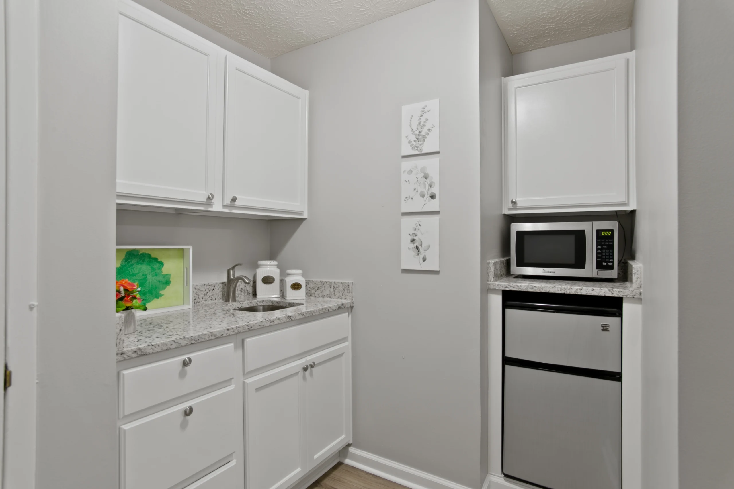 pantry/ kitchen area of one of the bedroom in bellevue village at woodstock